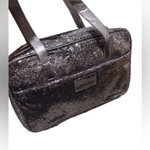 Joan Boyce silver sequin jewelry accessory bag